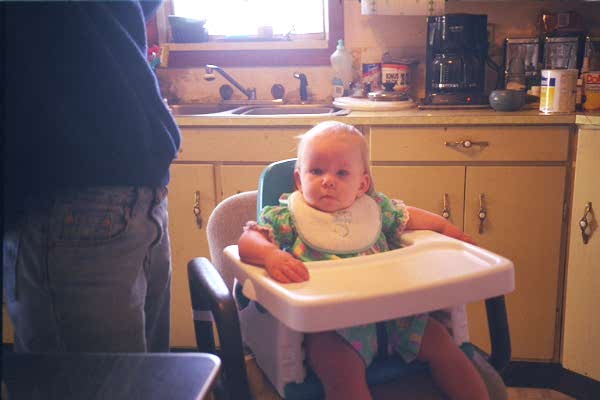 Carrie in her high chair on Easter.