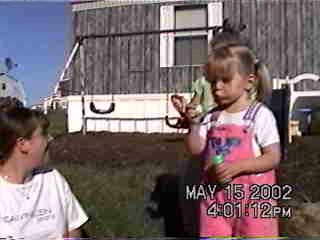 Carrie blowing bubbles - 5/15/02