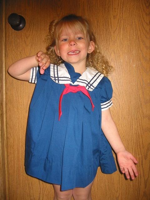 Carrie wanted to dress up like Shirley Temple.  Mom set her hair in rags.