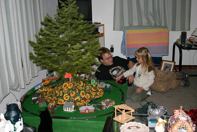 Shawn and Carrie playing with trains.