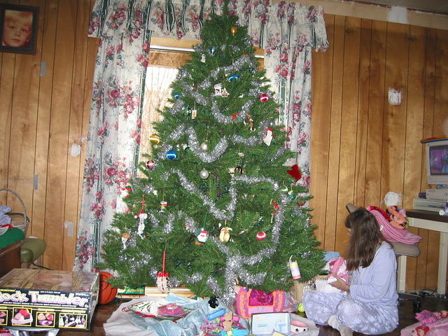 Mom's sorting through presents the day after Christmas.