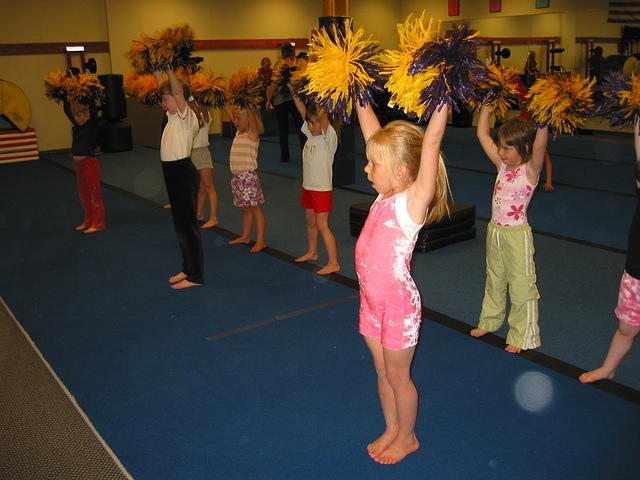 Practicing a cheer.