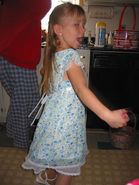 Carrie spinning in her Easter dress.