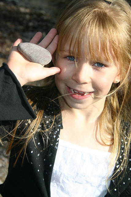 Carrie collecting rocks.