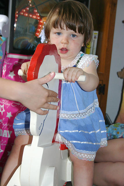 Joleigh on her rocking horse.