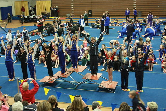 Carrie - 7th on Bars - Bozeman Blizzard