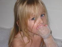 Carrie taking a bubble bath - 12/9/02