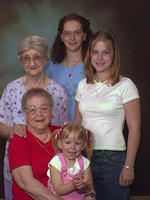 Clockwise, starting at bottom.
Carrie, Gram, Great Grandma Wolff, Carol, Paige - 5/23/02