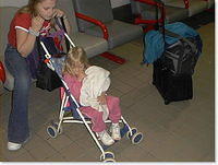 Paige and Carrie at the airport - 5/26/02