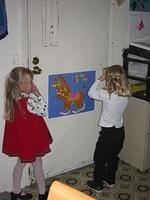 Carrie, and Jayde taking her turn at pin the tail on the donkey - 11/8/03