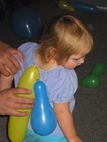 ? with balloons stuck on her back.  She kept spinning in circles trying to reach them - 11/8/03