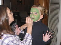 Grandmom putting on Carrie's make-up.