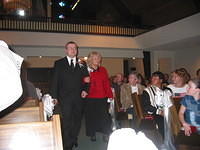 Tim escorting Rozanne down the aisle. (Michelle's brother and mother.) 10/4/03