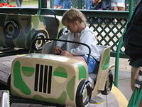 Carrie on these spinny jeep things. :P