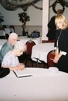 Great Grandma Wolff signing the Memory Book