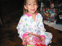 Santa brought her a Strawberry Shortcake telephone for her room.