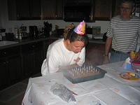 Michelle, blowing out her candles