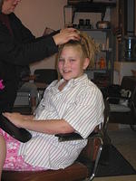 Amber getting her hair done.