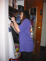 Mom, sewing Carrie's dress in the closet at the beauty shop.