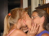 Carrie and Mom hide to kiss.