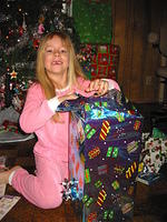 Carrie opening a big present