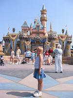 Carrie in front of Sleeping Beauty Castle.