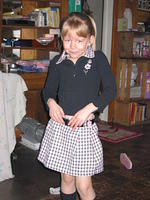 Carrie, about to head to the bus stop for school.