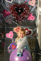 Carrie and her ball and the door decorated for Valentine's Day