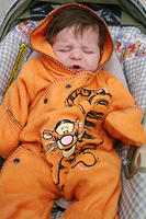 My niece, all dressed up in Tigger. :)