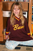 Carrie wearing my Dad's old softball jersey