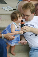 Joleigh drinking Daddy's root beer.