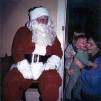 Paige with Mom, when Santa visited the house.  Yes, I'm crying.  I was terrified. ;) 12/02/1981