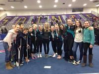 A group of current MHG gymnasts and previous gymnasts at the 2016 Montana State Cup